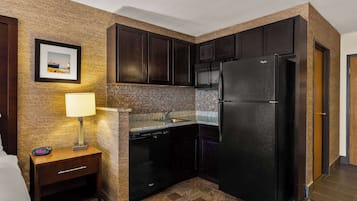 Premium bedding, desk, laptop workspace, iron/ironing board