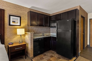 Premium bedding, desk, laptop workspace, iron/ironing board
