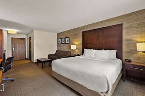 Premium bedding, desk, laptop workspace, iron/ironing board