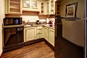 ADA Accessible Suite, 1 King Bed, Accessible (Roll-In Shower) | Private kitchen | Fridge, microwave, coffee/tea maker