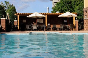 Seasonal outdoor pool, open 9:00 AM to 9:00 PM, sun loungers