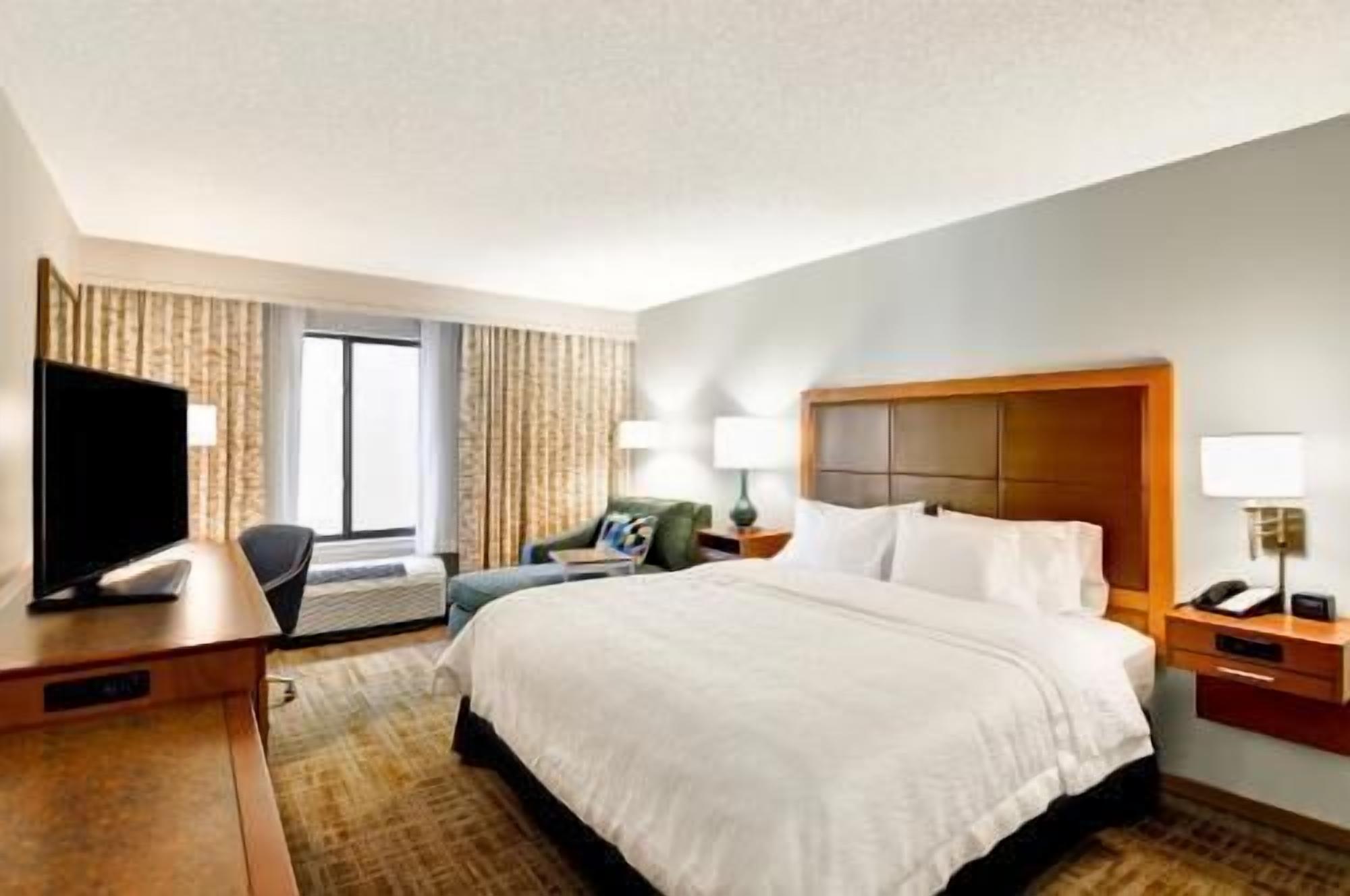 Hypo-allergenic bedding, desk, blackout drapes, iron/ironing board