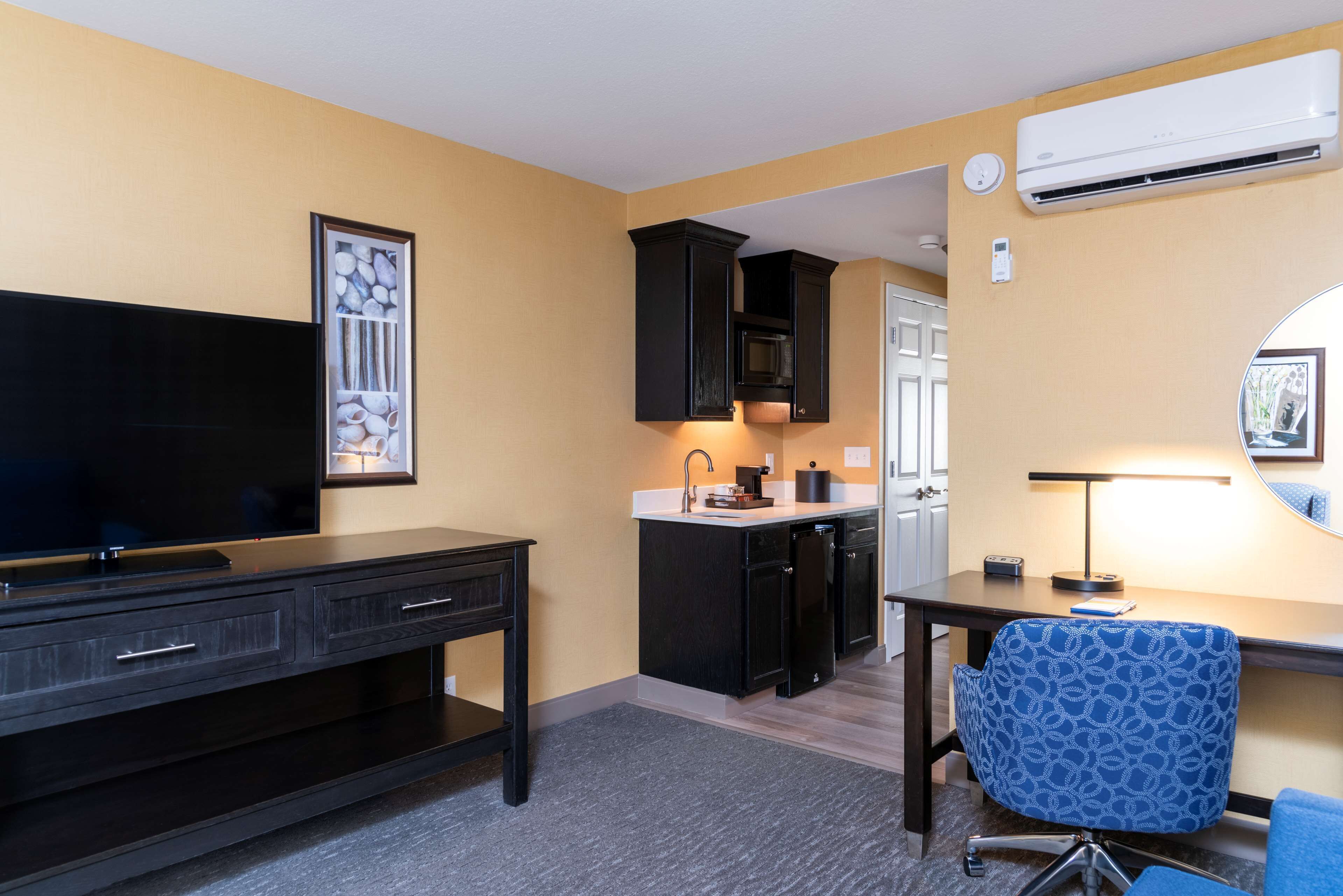 suite, 2 queen beds, non smoking | in-room safe, desk, laptop workspace, blackout curtains