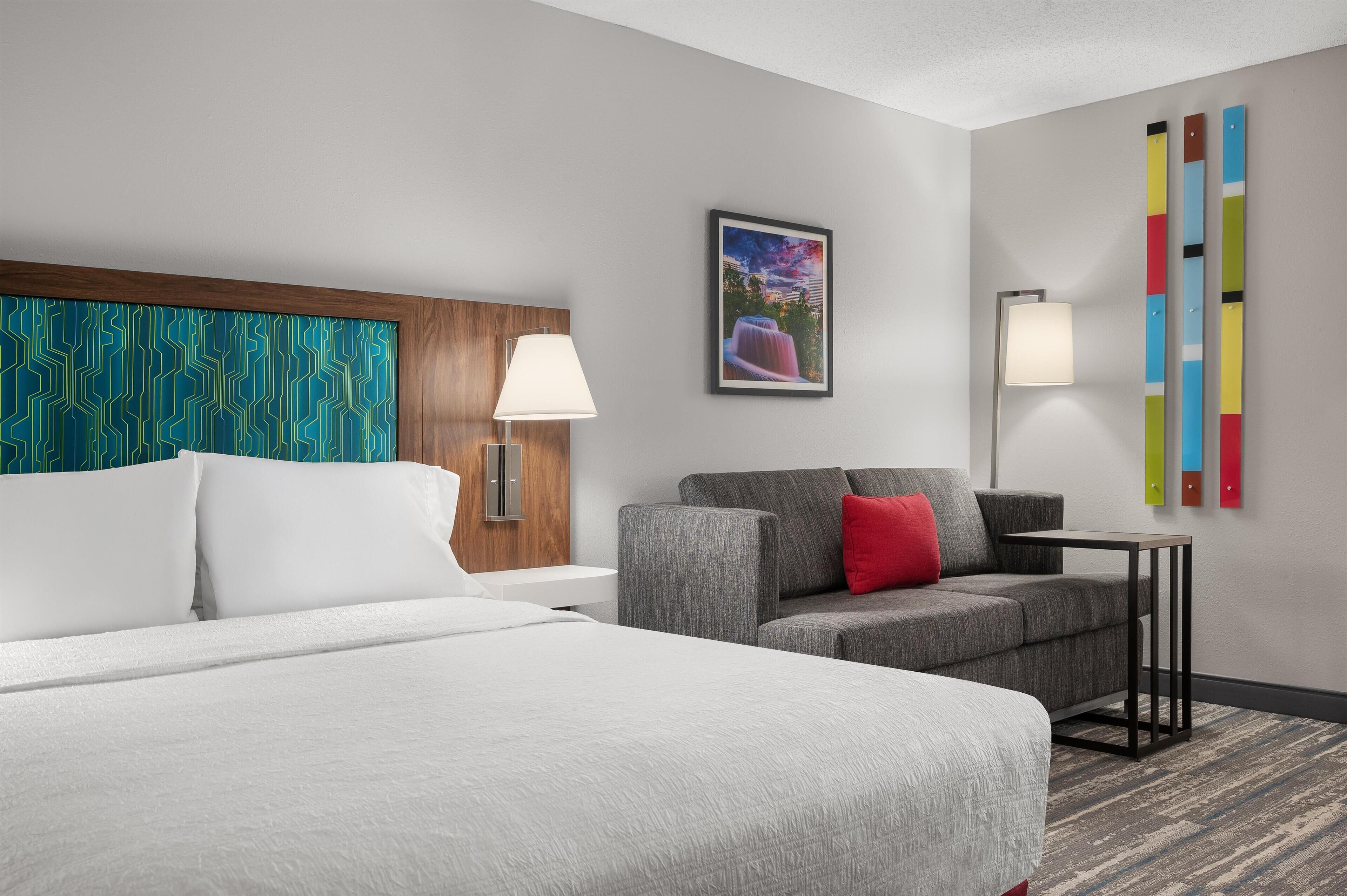 Premium bedding, pillow-top beds, blackout curtains, iron/ironing board