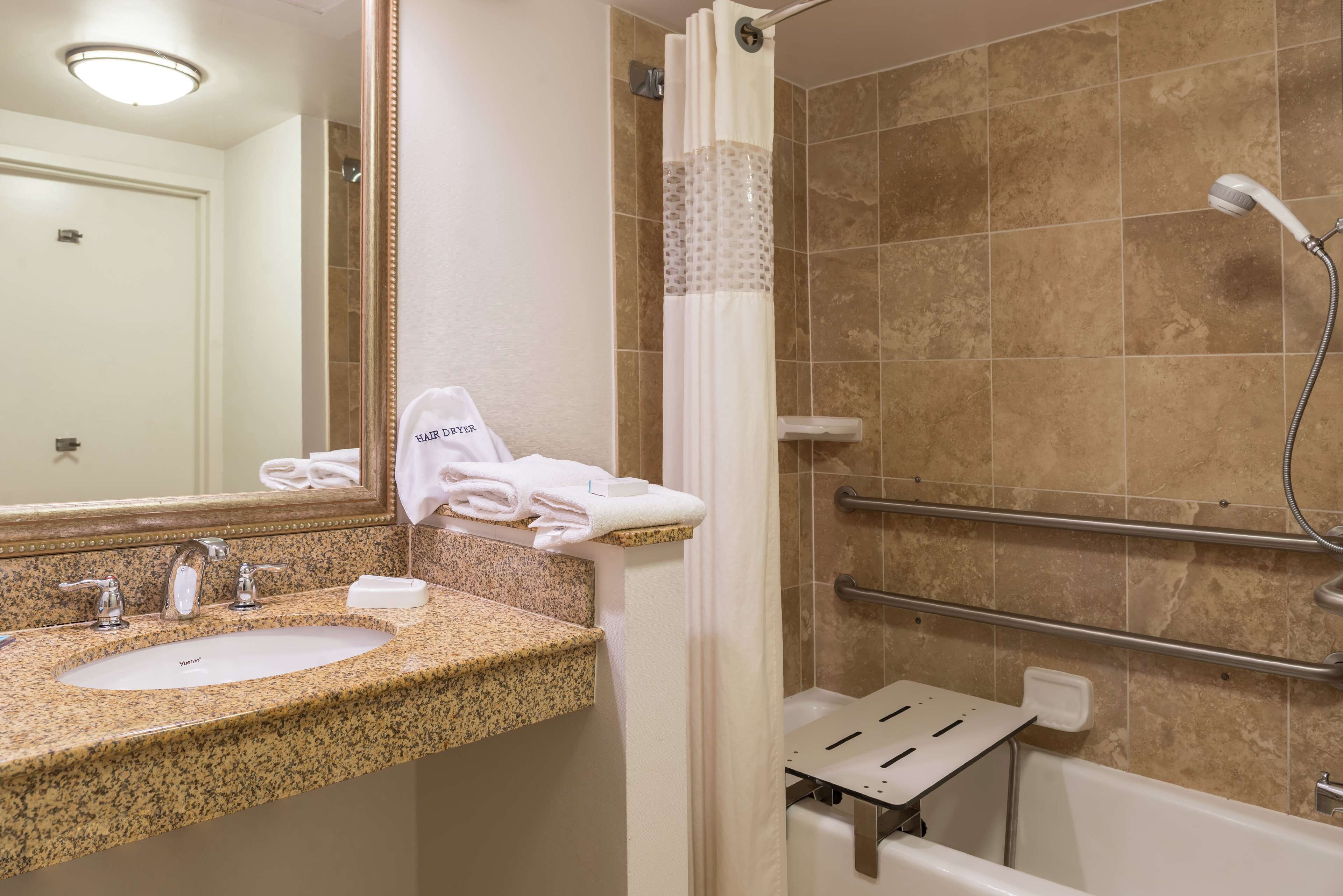 combined shower/bathtub, free toiletries, hair dryer, towels