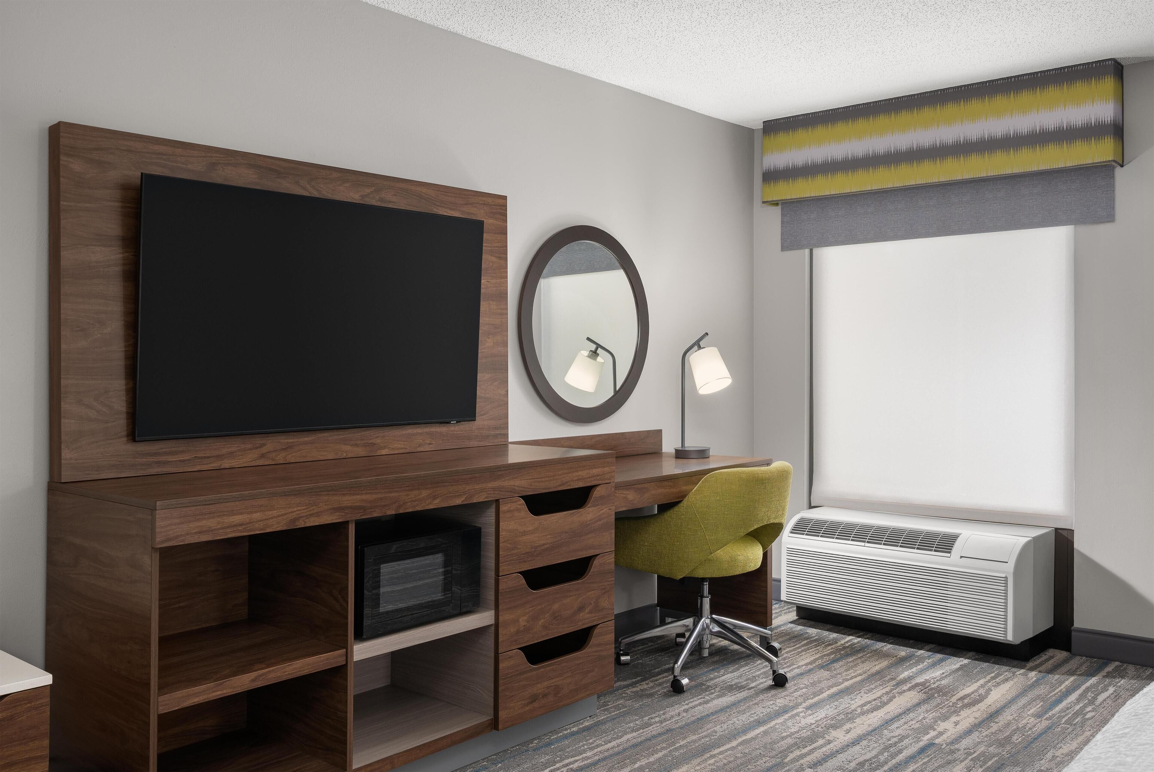 Premium bedding, pillow-top beds, blackout curtains, iron/ironing board