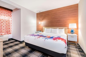 Premium bedding, desk, iron/ironing board, free cribs/infant beds