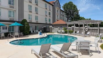 Outdoor pool, open 10:00 AM to 10:00 PM, pool loungers