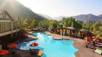 8 outdoor pools, open 9:00 AM to 9:00 PM, pool cabanas (surcharge)