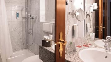 Hair dryer, towels, soap, shampoo
