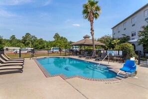 Outdoor pool, open 9:00 AM to 10:00 PM, pool umbrellas, sun loungers