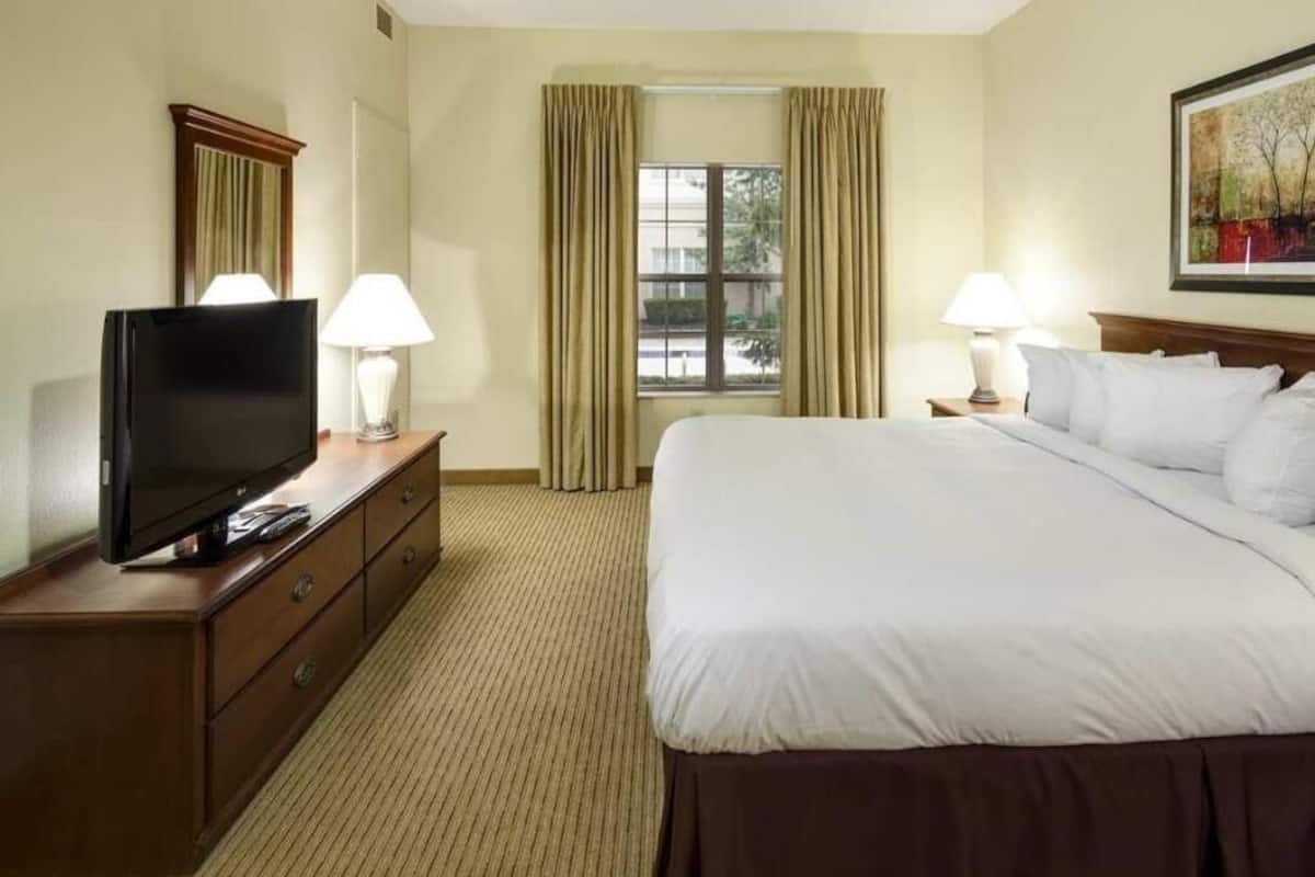 Premium bedding, desk, blackout drapes, iron/ironing board