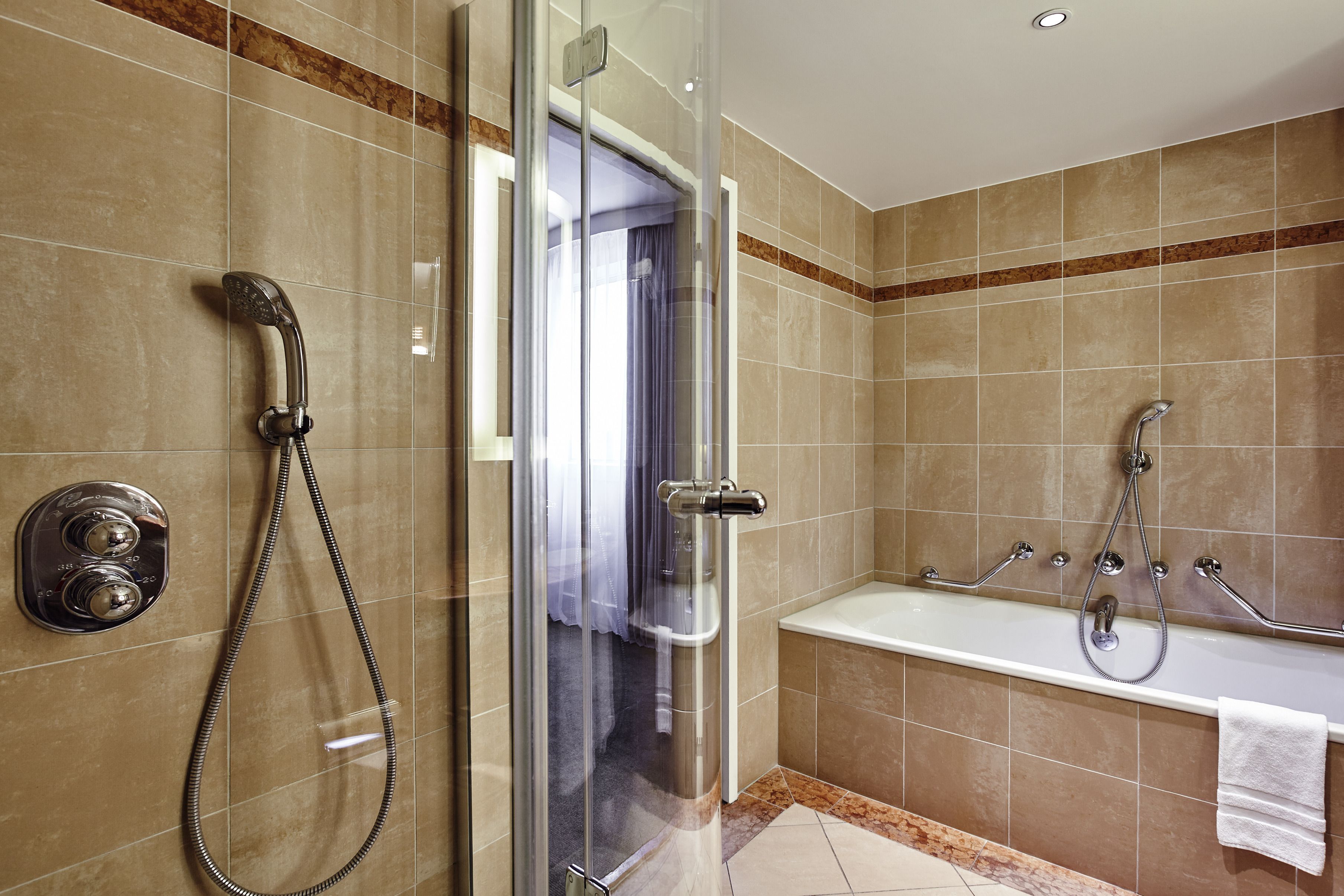 designer toiletries, hair dryer, bathrobes, towels