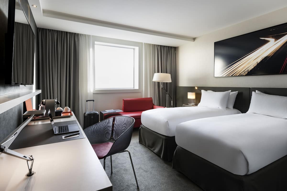 Deluxe Room, 2 Twin Beds (Defense view) | Premium bedding, in-room safe, desk, blackout drapes