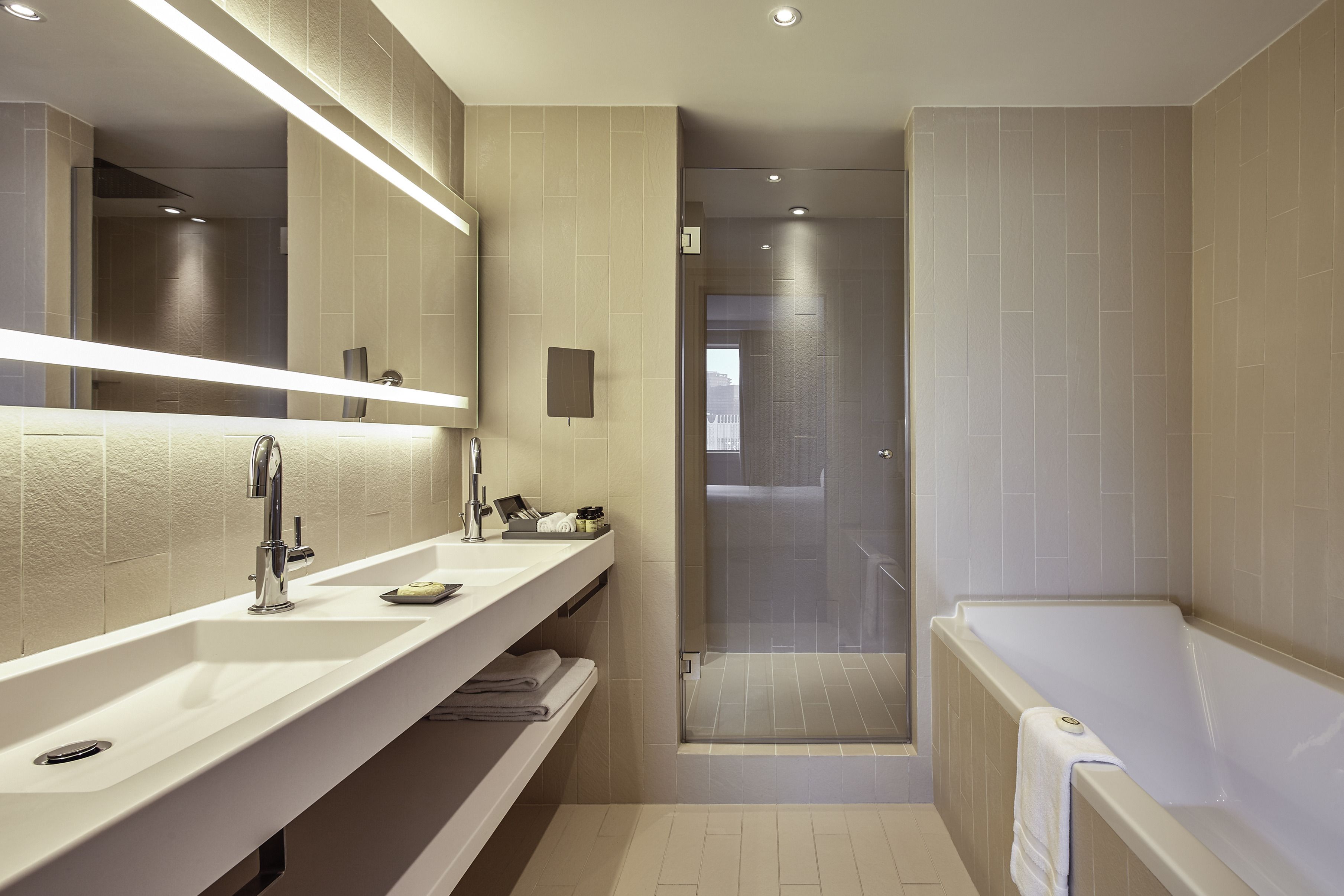 designer toiletries, hair dryer, bathrobes, towels