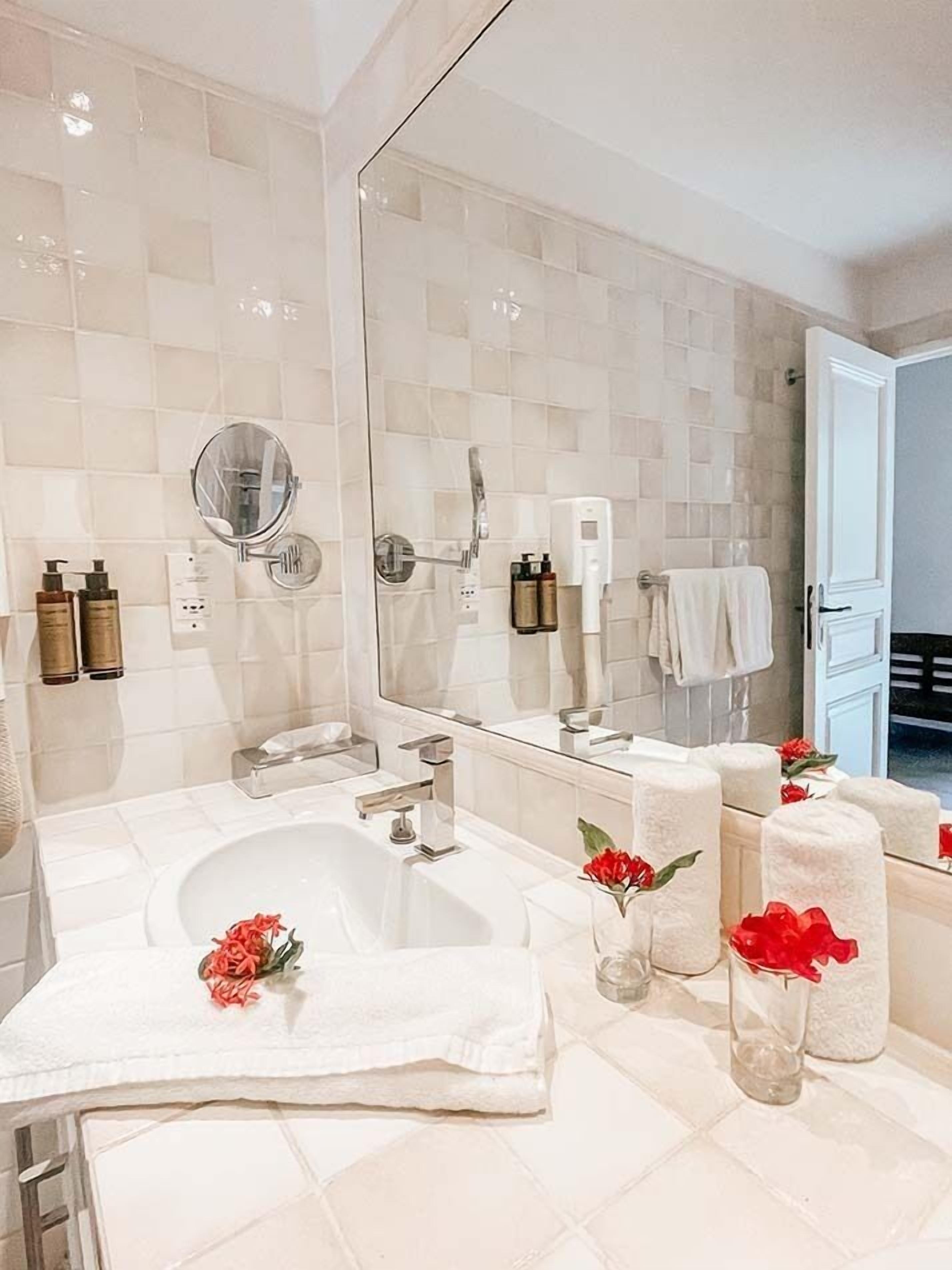 shower, rainfall showerhead, designer toiletries, hair dryer