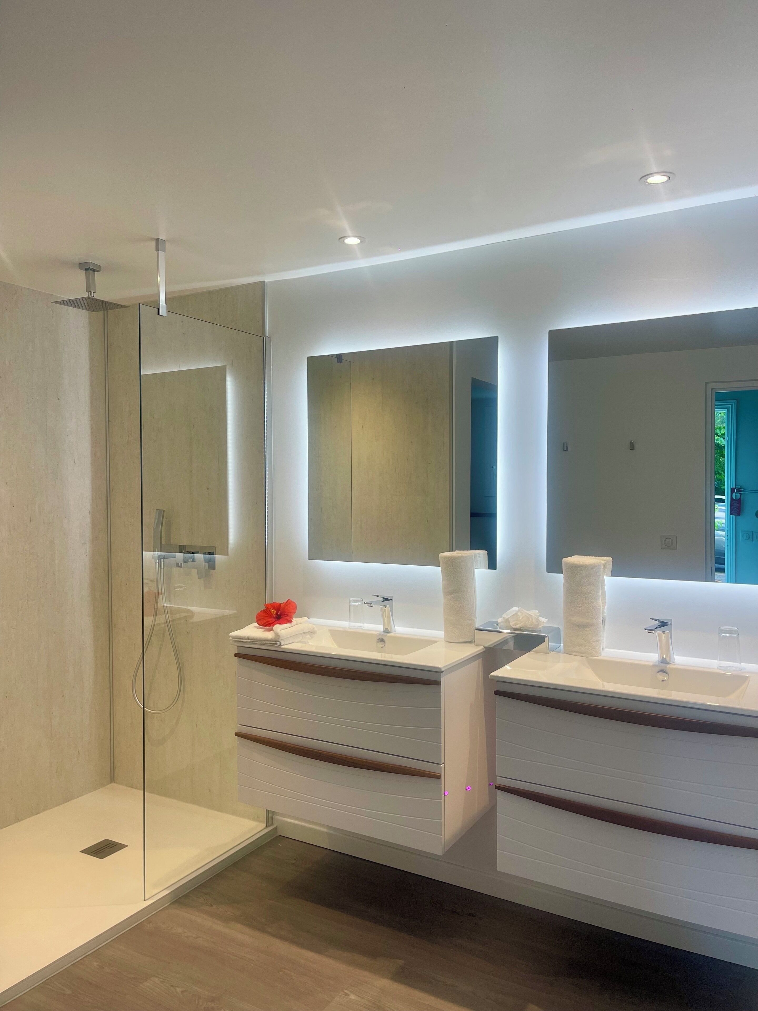 master suite sea view | bathroom | shower, rainfall showerhead, designer toiletries, hair dryer