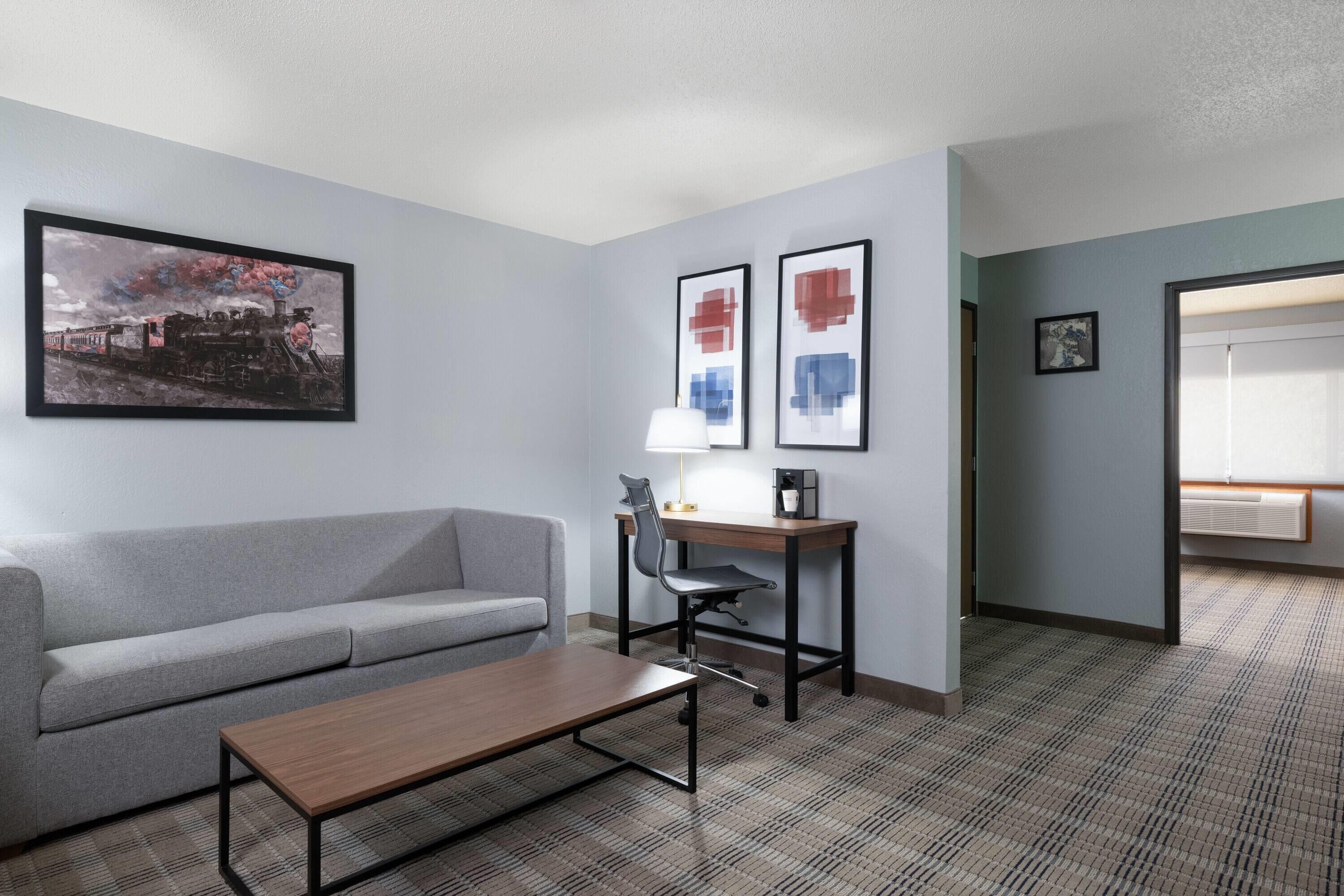 Deluxe Suite, 1 Bedroom, Non Smoking (1 King Bed and Sofa Bed) | Premium bedding, individually furnished, desk, laptop workspace