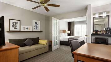 Suite, 1 Bedroom, Non Smoking | Desk, laptop workspace, blackout drapes, iron/ironing board