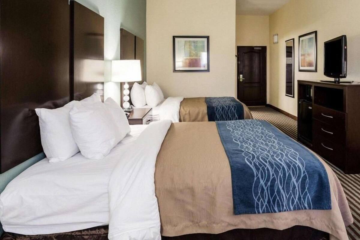 Premium bedding, Select Comfort beds, desk, laptop workspace