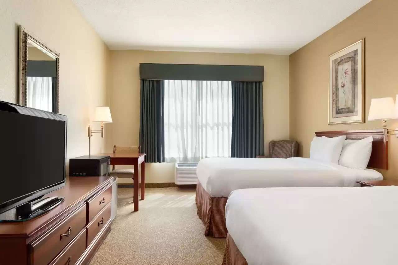 desk, blackout curtains, iron/ironing board, free cots/infant beds