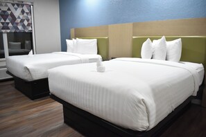 Desk, blackout drapes, iron/ironing board, free cribs/infant beds