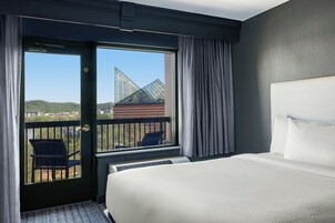 Desk, laptop workspace, iron/ironing board, free cribs/infant beds