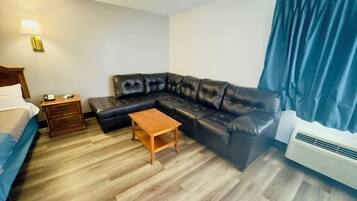 Desk, laptop workspace, blackout curtains, iron/ironing board