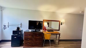Desk, laptop workspace, blackout curtains, iron/ironing board