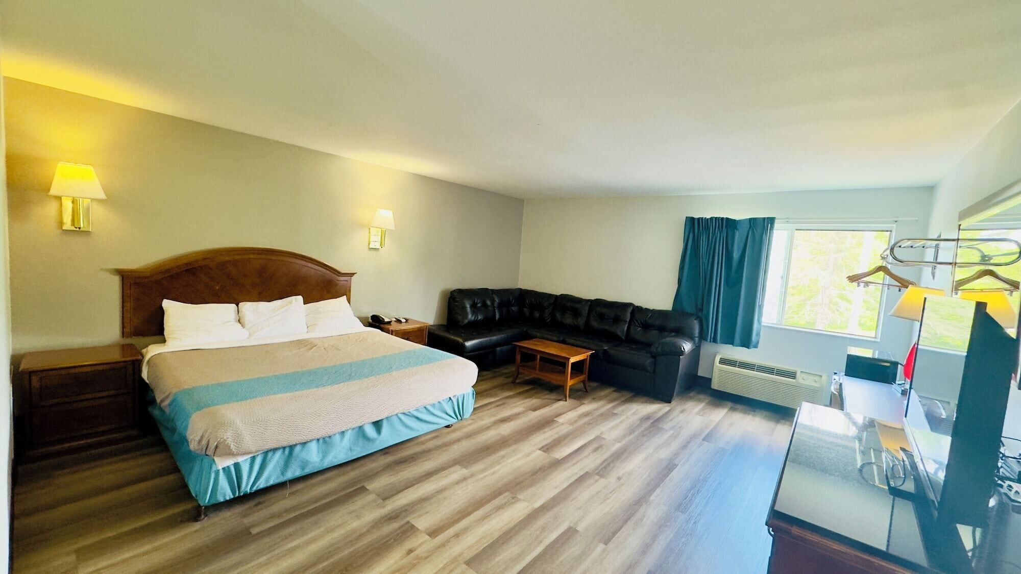 Desk, laptop workspace, blackout curtains, iron/ironing board