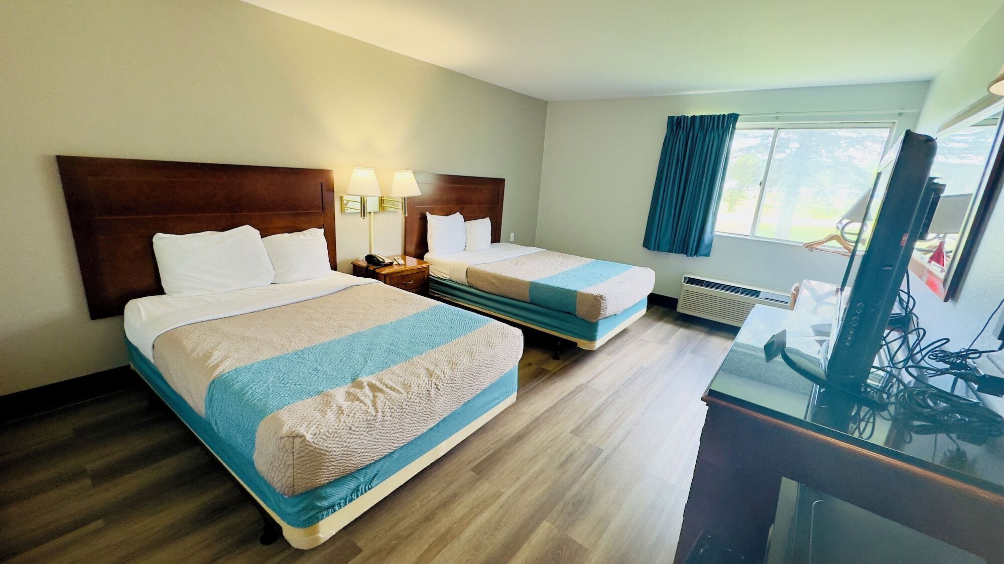 Desk, laptop workspace, blackout curtains, iron/ironing board