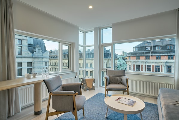 Chambre Deluxe | Coin séjour