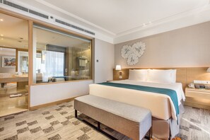 Premium bedding, free minibar items, in-room safe, desk