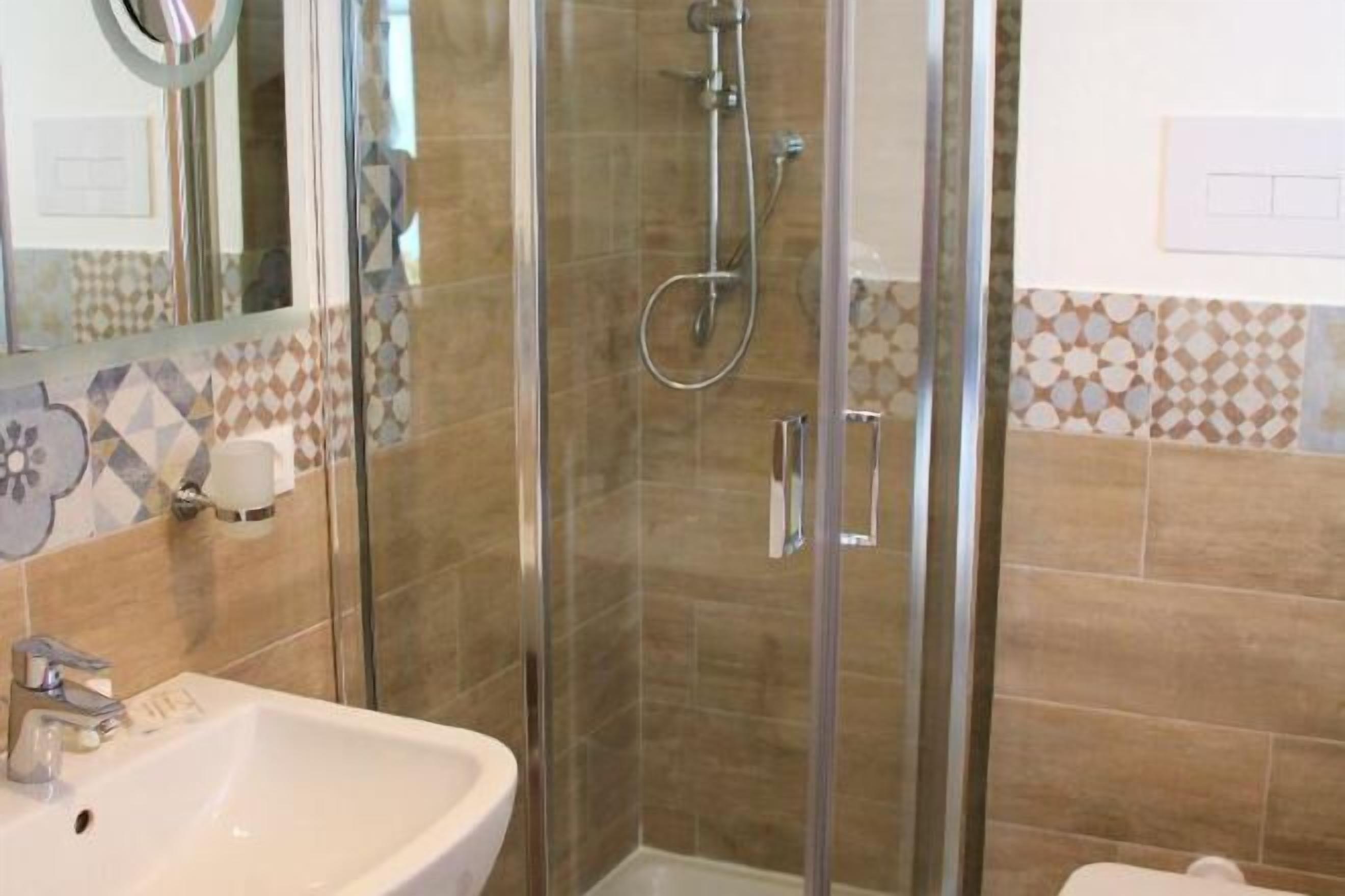 Bathroom | Shower, free toiletries, hair dryer, bidet