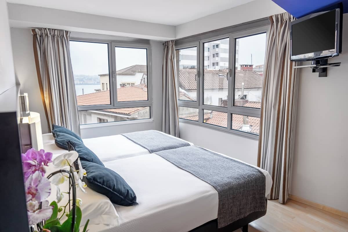 2 single beds | In-room safe, desk, laptop workspace, free WiFi