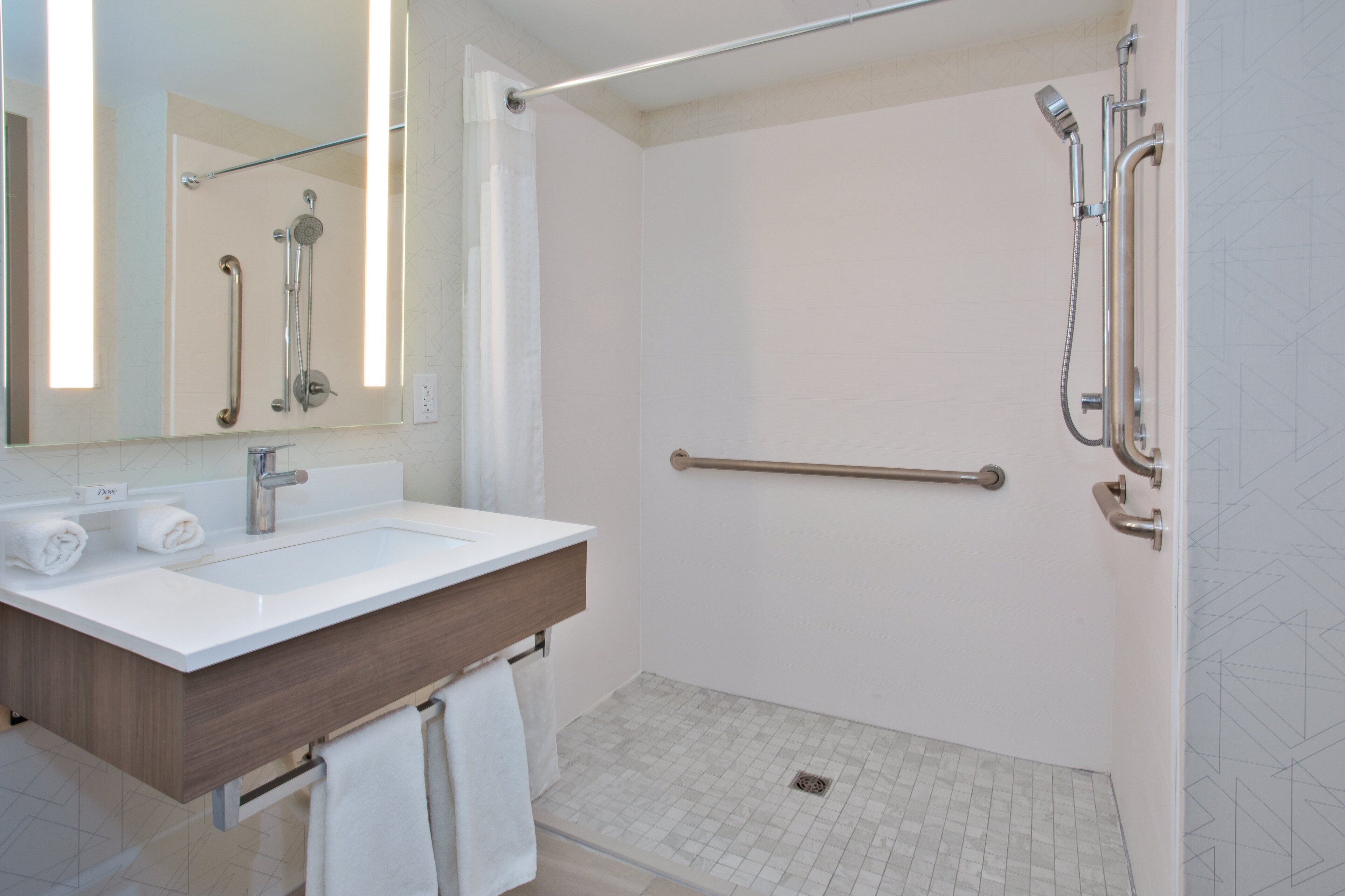 combined shower/bathtub, free toiletries, hair dryer, towels