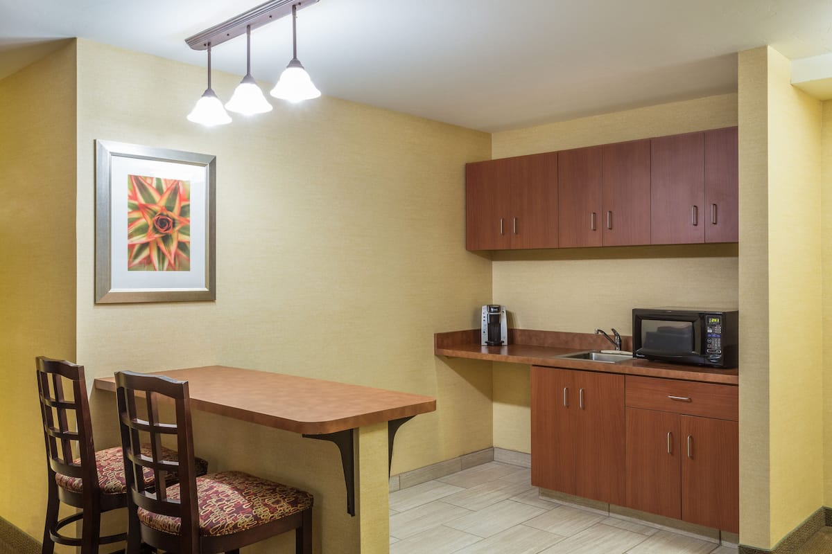 Suite, 1 Bedroom (Additional Living Area) | In-room safe, desk, iron/ironing board, cribs/infant beds