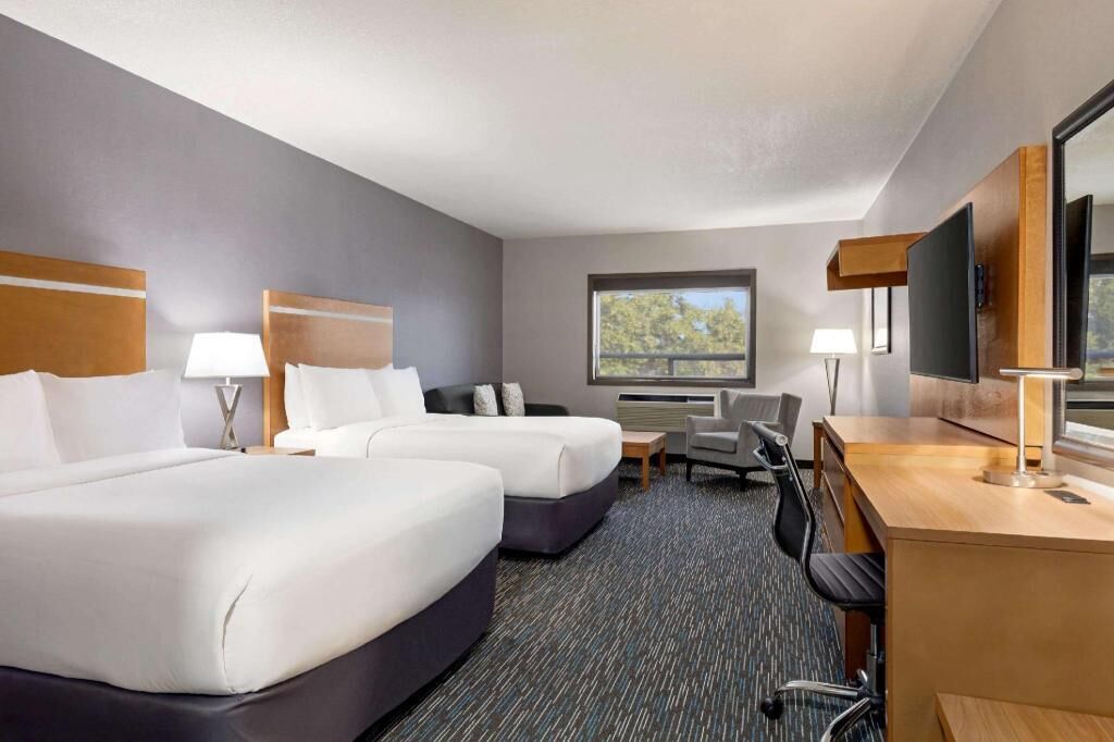 Down comforters, pillowtop beds, desk, laptop workspace