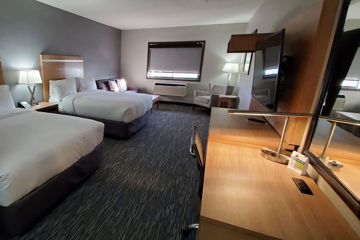 Down comforters, pillowtop beds, desk, laptop workspace