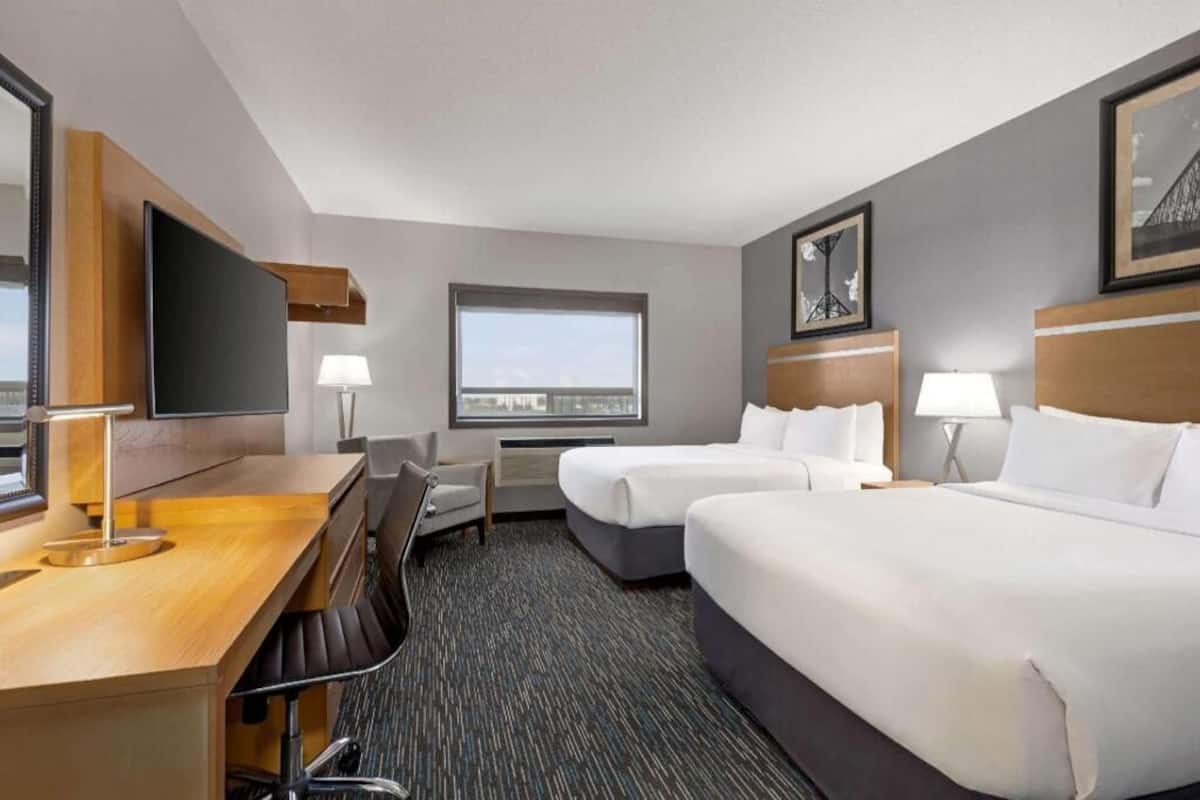 Down comforters, pillowtop beds, desk, laptop workspace