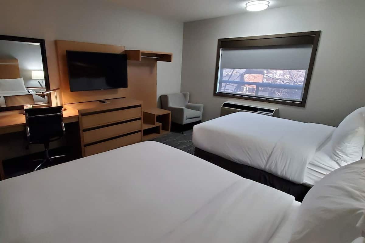 Down comforters, pillowtop beds, desk, laptop workspace