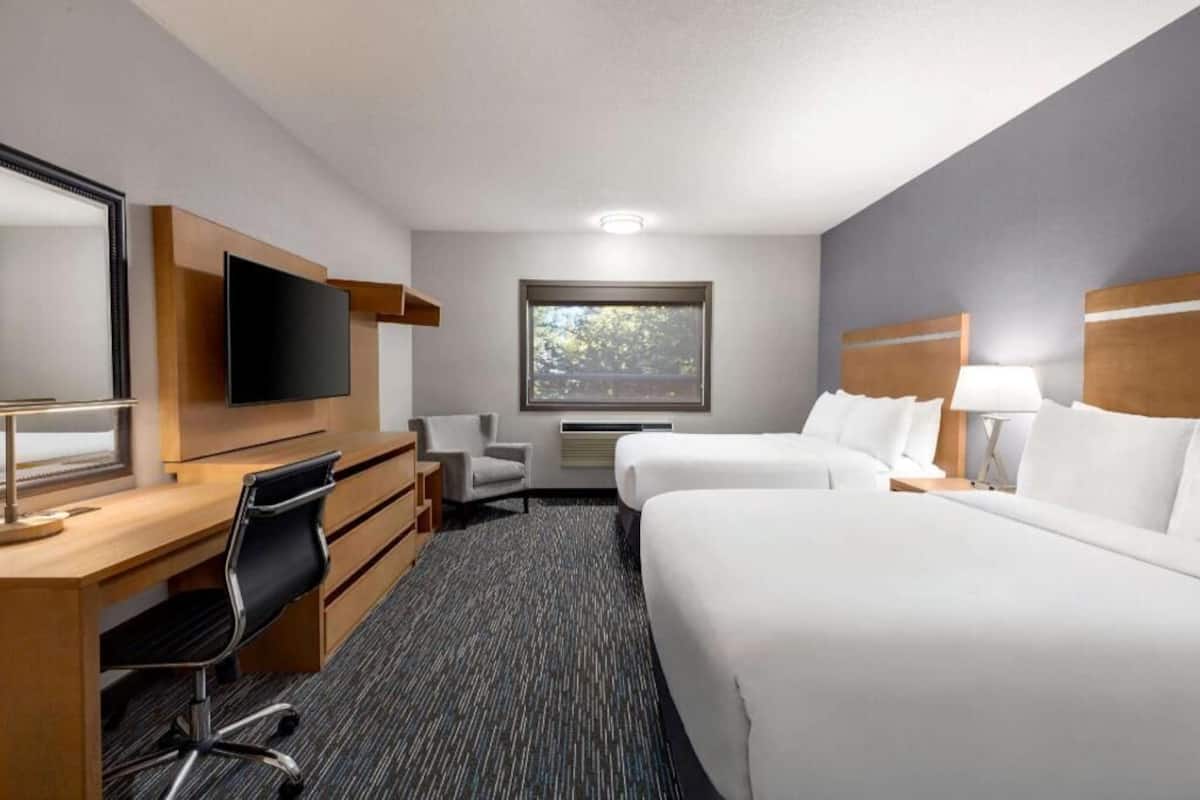 Down comforters, pillowtop beds, desk, laptop workspace