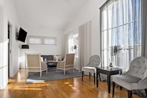 Suite, 1 King Bed, Non Smoking, Hot Tub (Living Room) | Desk, blackout curtains, iron/ironing board, free cots/infant beds