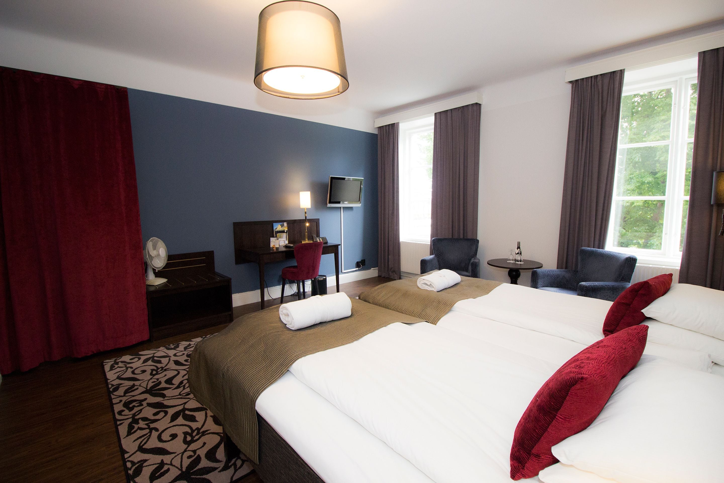 Superior dubbelrum | Minibar, värdeförvaringsskåp på rummet och skrivbord