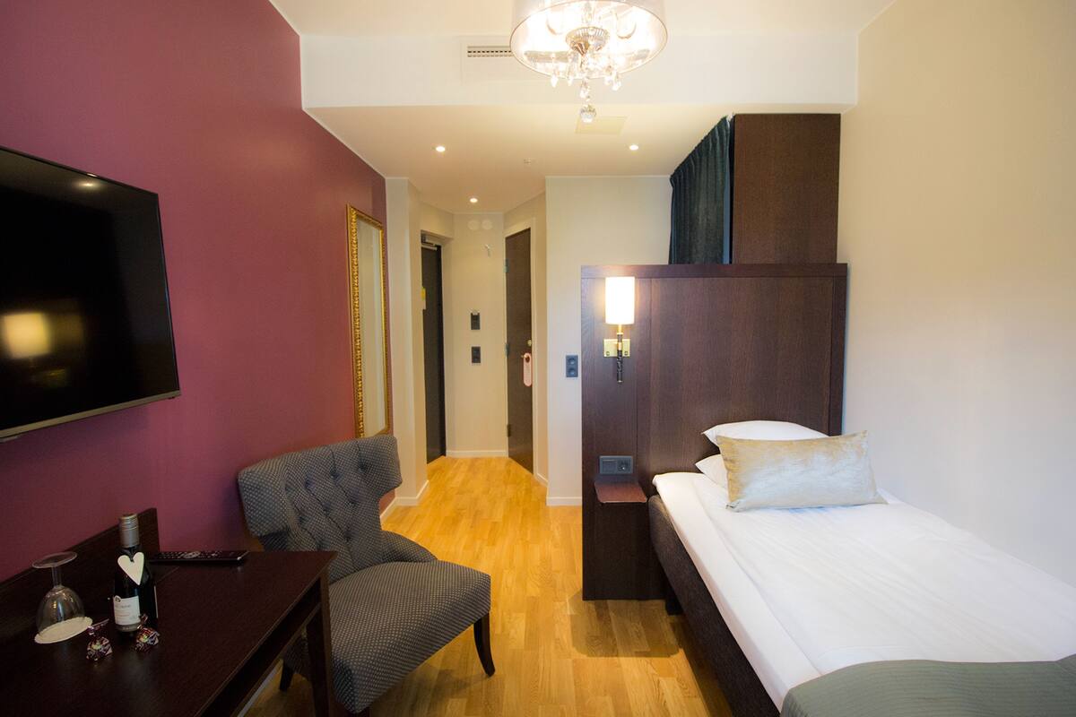 Comfort Single Room - Separate Building | Minibar, in-room safe, desk, laptop workspace
