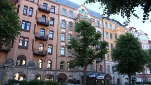 A multi-story hotel with a classic architectural style, featuring arched windows and balconies. - Hotel Lorensberg (Gothenburg)