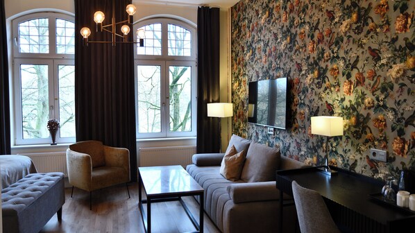 Deluxe Room, 1 Queen Bed with Sofa bed, Non Smoking | Desk, iron/ironing board, cribs/infant beds, rollaway beds