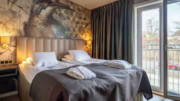 Superior tvÄbÀddsrum | Skrivbord, gratis wi-fi och sÀngklÀder