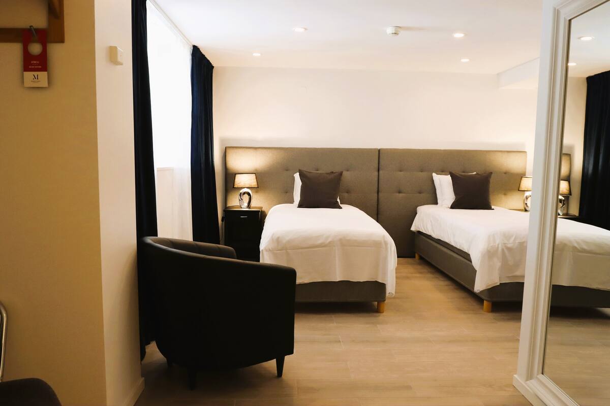 double or twin room | premium bedding, in-room safe, desk, laptop workspace