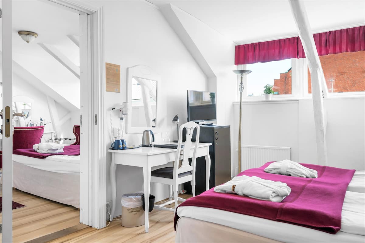 family room, 2 bedrooms, connecting rooms, city view | 1 bedroom, premium bedding, in-room safe, individually decorated